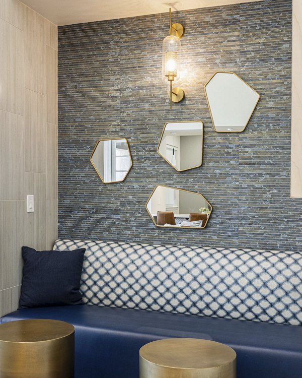 Clubhouse featuring modern interiors and cozy seating at Canyon Park Apartments in Greystar luxury community