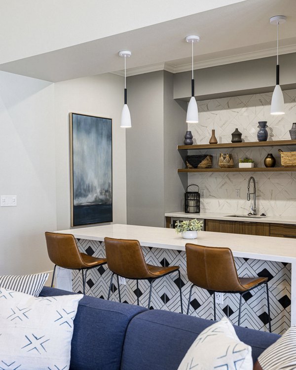 Canyon Park Apartments: Modern clubhouse with stylish decor and seating area