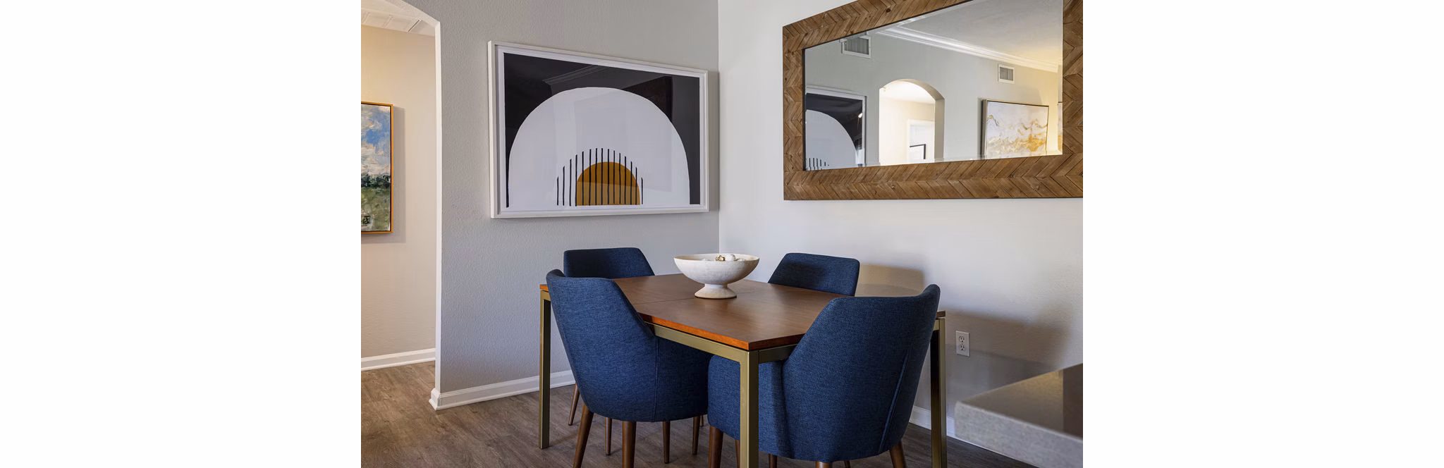 Dining area with sleek furnishings and modern lighting in Canyon Park Apartments