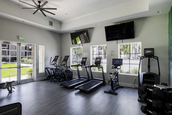 Revamped fitness center at Canyon Park Apartments featuring state-of-the-art equipment and spacious workout areas