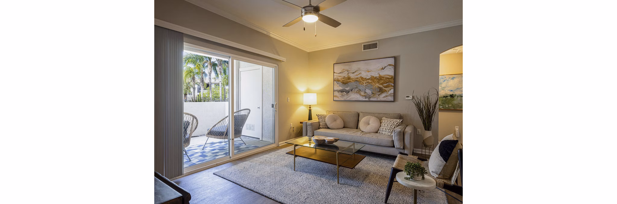 Spacious living room with modern decor in Canyon Park Apartments, featuring comfortable seating and ample natural light