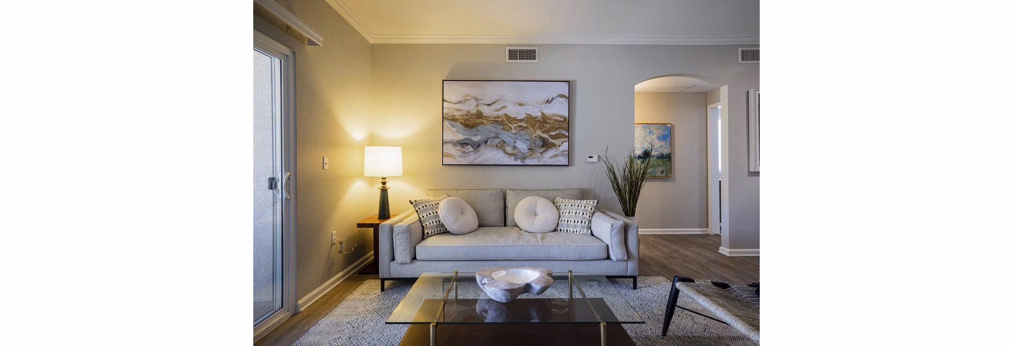Spacious living room with modern furnishings at Canyon Park Apartments in a serene setting
