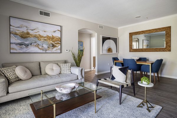 Spacious living room with modern furnishings in Canyon Park Apartments, perfect for comfortable living and entertaining