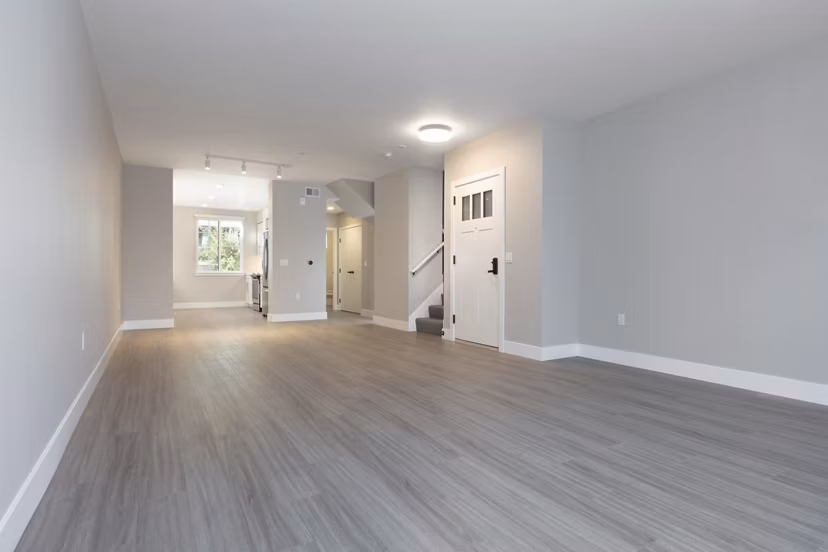 Modern living room with sleek furnishings at 599 Castro Apartments, offering luxury urban living in a prime location
