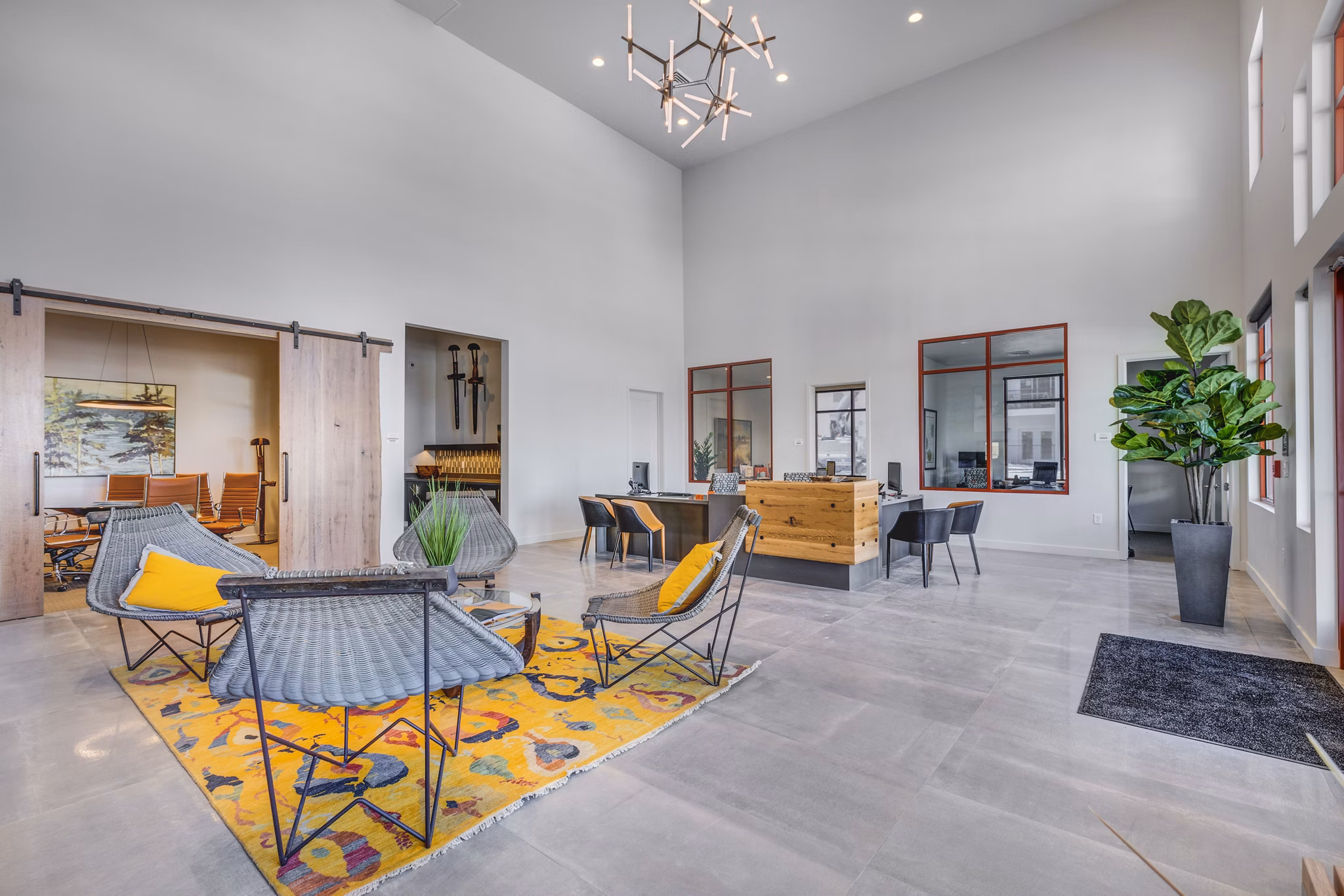 Clubhouse lounge with modern seating and decor at Aspira at Anthem Apartments