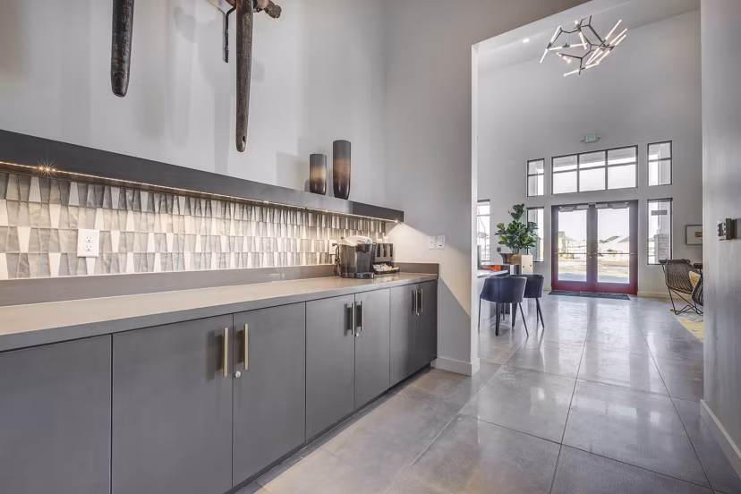 Clubhouse with modern furnishings at Aspira at Anthem Apartments, offering luxury spaces for social gatherings and community events