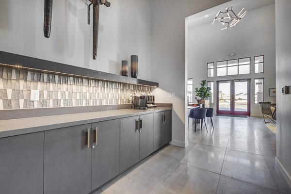 Clubhouse with modern furnishings at Aspira at Anthem Apartments, offering luxury spaces for social gatherings and community events