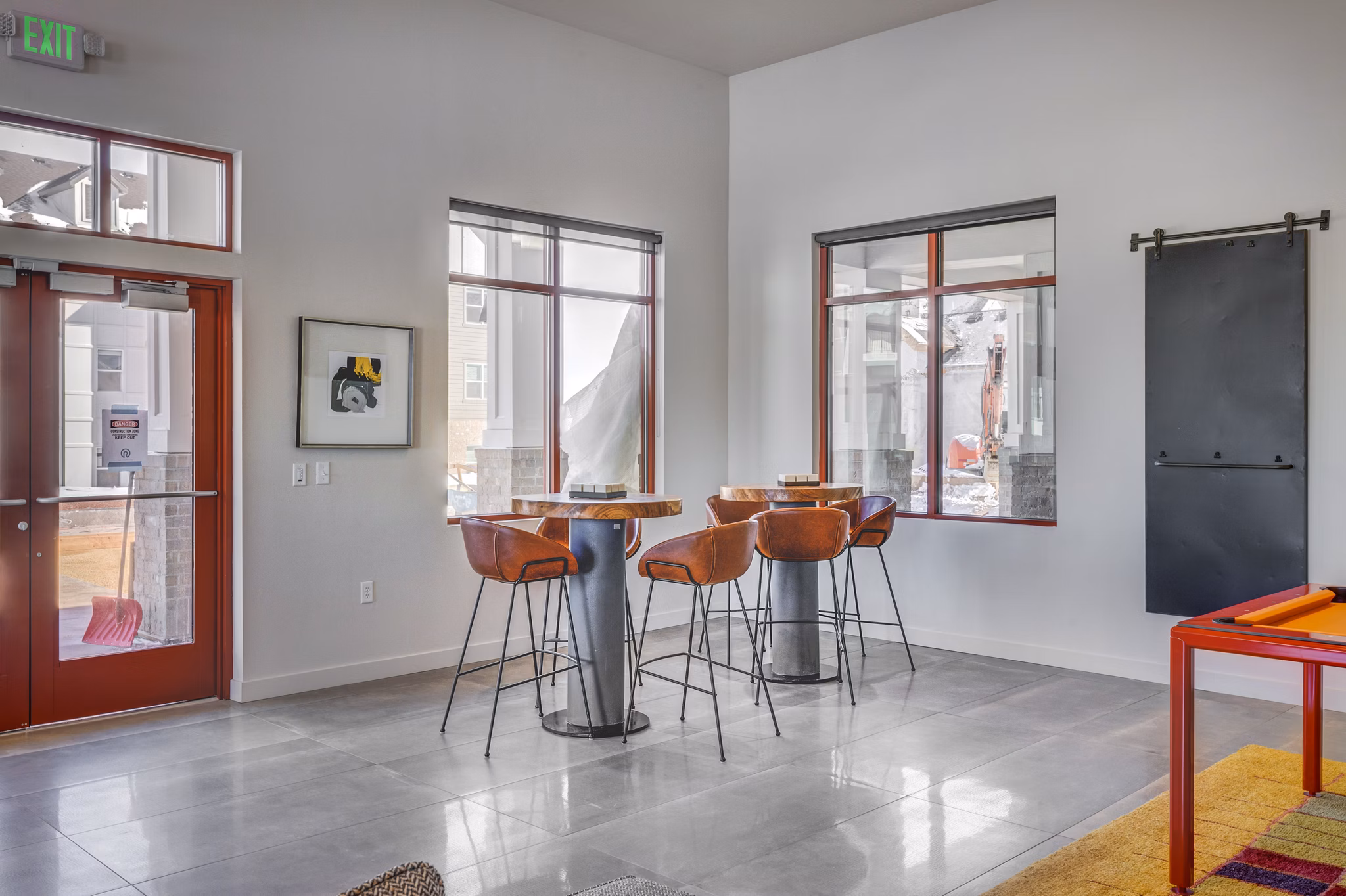 Clubhouse with modern design and cozy seating area at Aspira at Anthem Apartments, ideal for social gatherings and relaxation