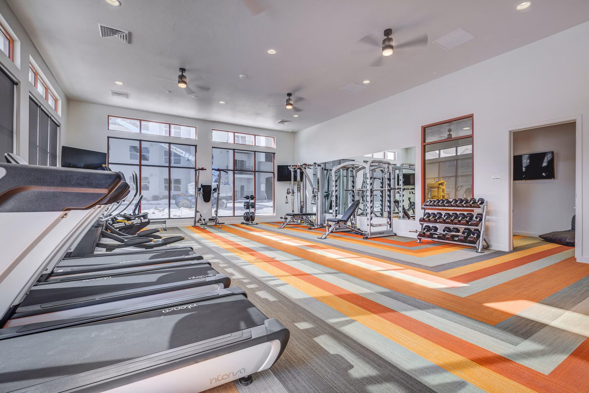 State-of-the-art fitness center featuring modern equipment at Aspira at Anthem Apartments