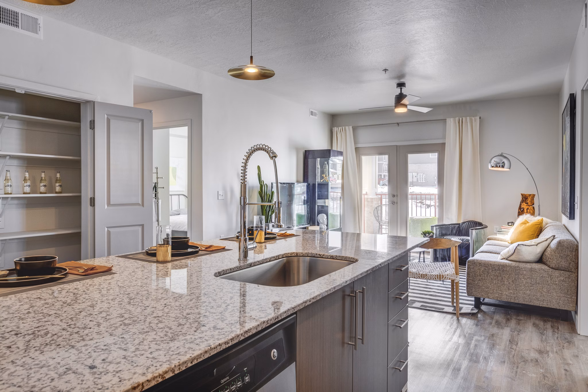 Modern kitchen with stainless steel appliances in Aspira at Anthem Apartments
