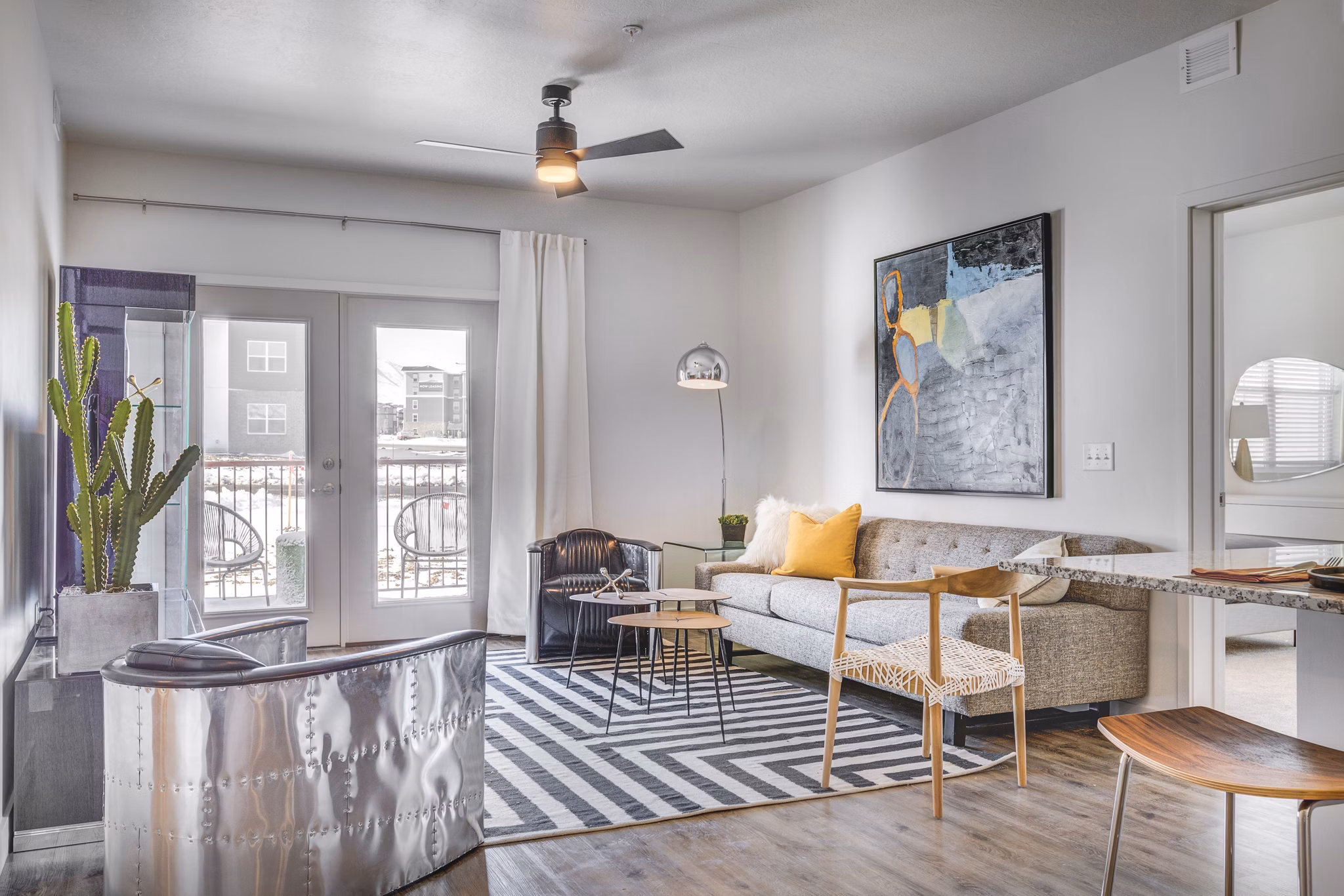 Modern living room with sleek furnishings at Aspira at Anthem Apartments