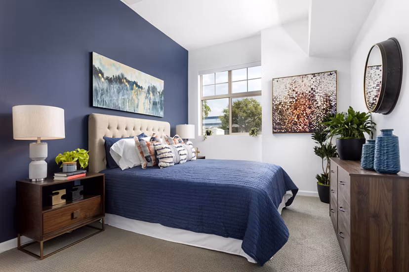 Cozy bedroom with modern decor at 7403 Apartments