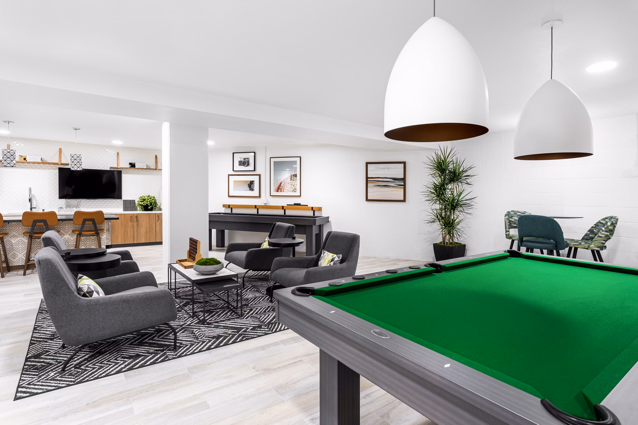 Clubhouse with modern design at 7403 Apartments, featuring luxury lounging areas for residents