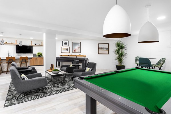 Clubhouse with modern design at 7403 Apartments, featuring luxury lounging areas for residents