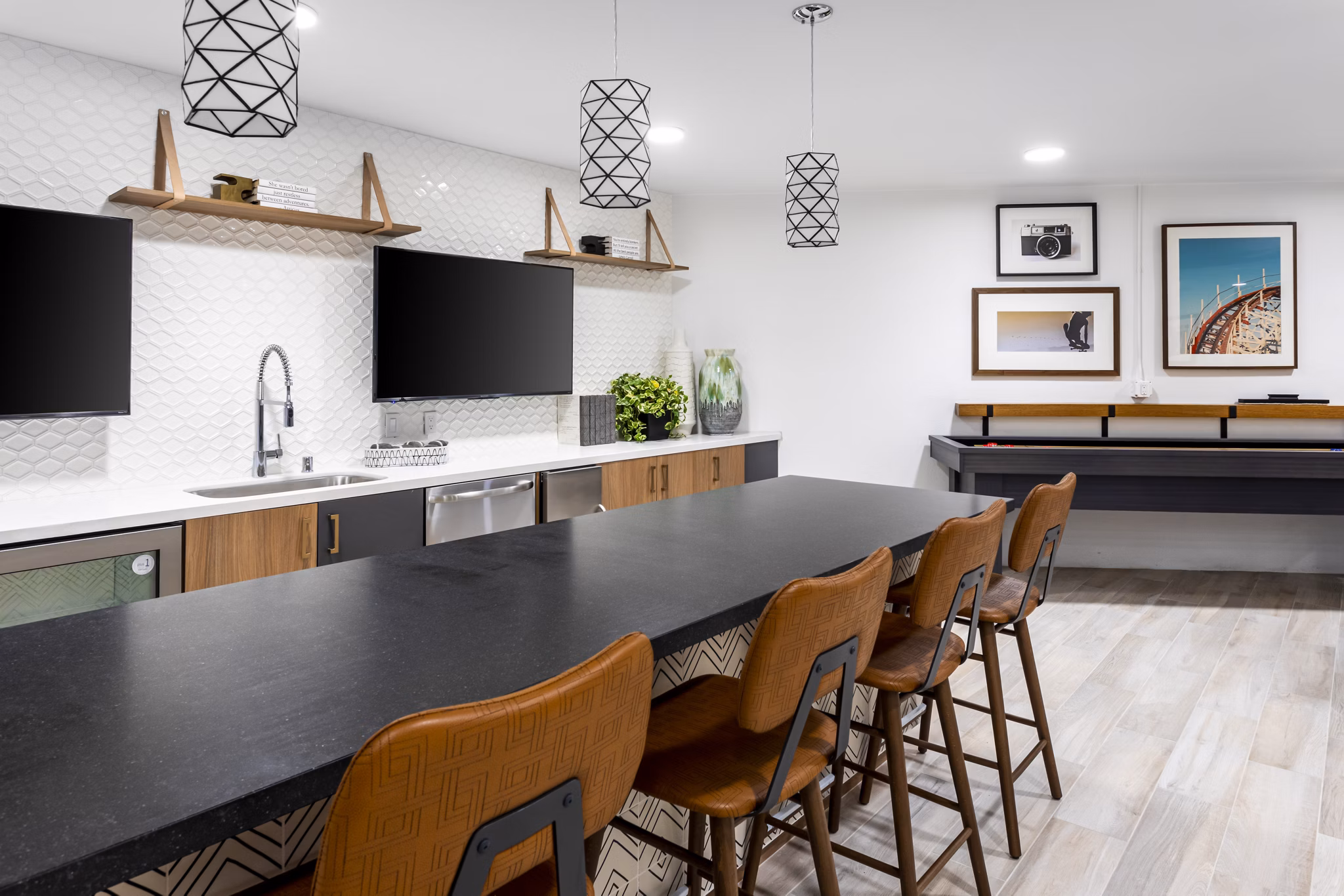Modern clubhouse featuring cozy seating areas at 7403 Apartments