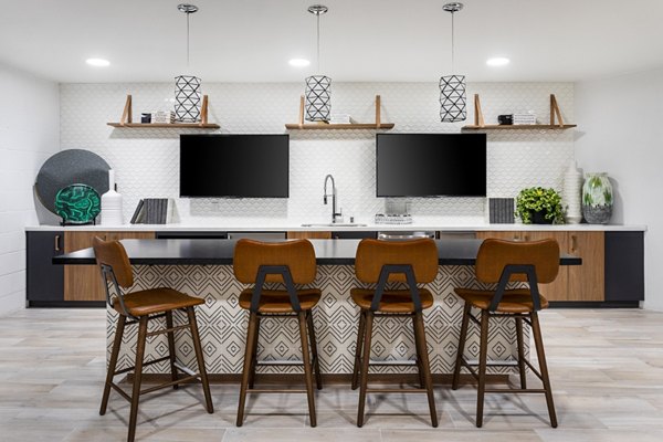 Clubhouse with modern furnishings at 7403 Apartments, a Greystar luxury community