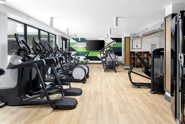 Modern fitness center with state-of-the-art equipment at 7403 Apartments