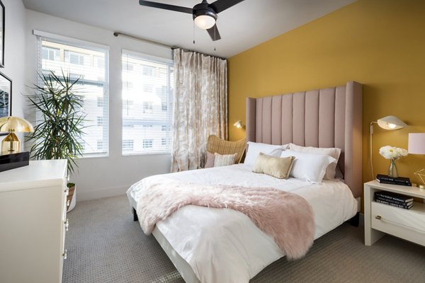 Modern bedroom with stylish decor at Jefferson Edge Apartments