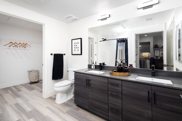 Modern bathroom with sleek fixtures in Jefferson Edge Apartments, showcasing luxury living by Greystar