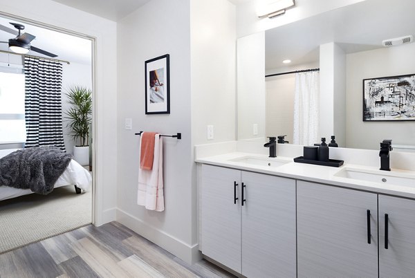 Modern bathroom with sleek fixtures at Jefferson Edge Apartments in luxury setting