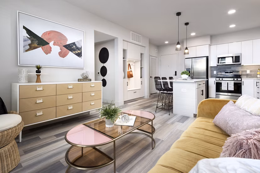 Living room featuring modern decor and natural lighting at Jefferson Edge Apartments