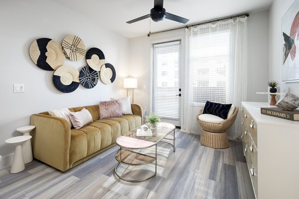 Spacious living room with stylish furnishings at Jefferson Edge Apartments, by Greystar Luxury Apartments in a vibrant community