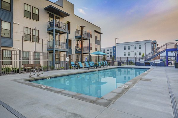 Rooftop pool with mountain views at Vida at Daybreak Apartments