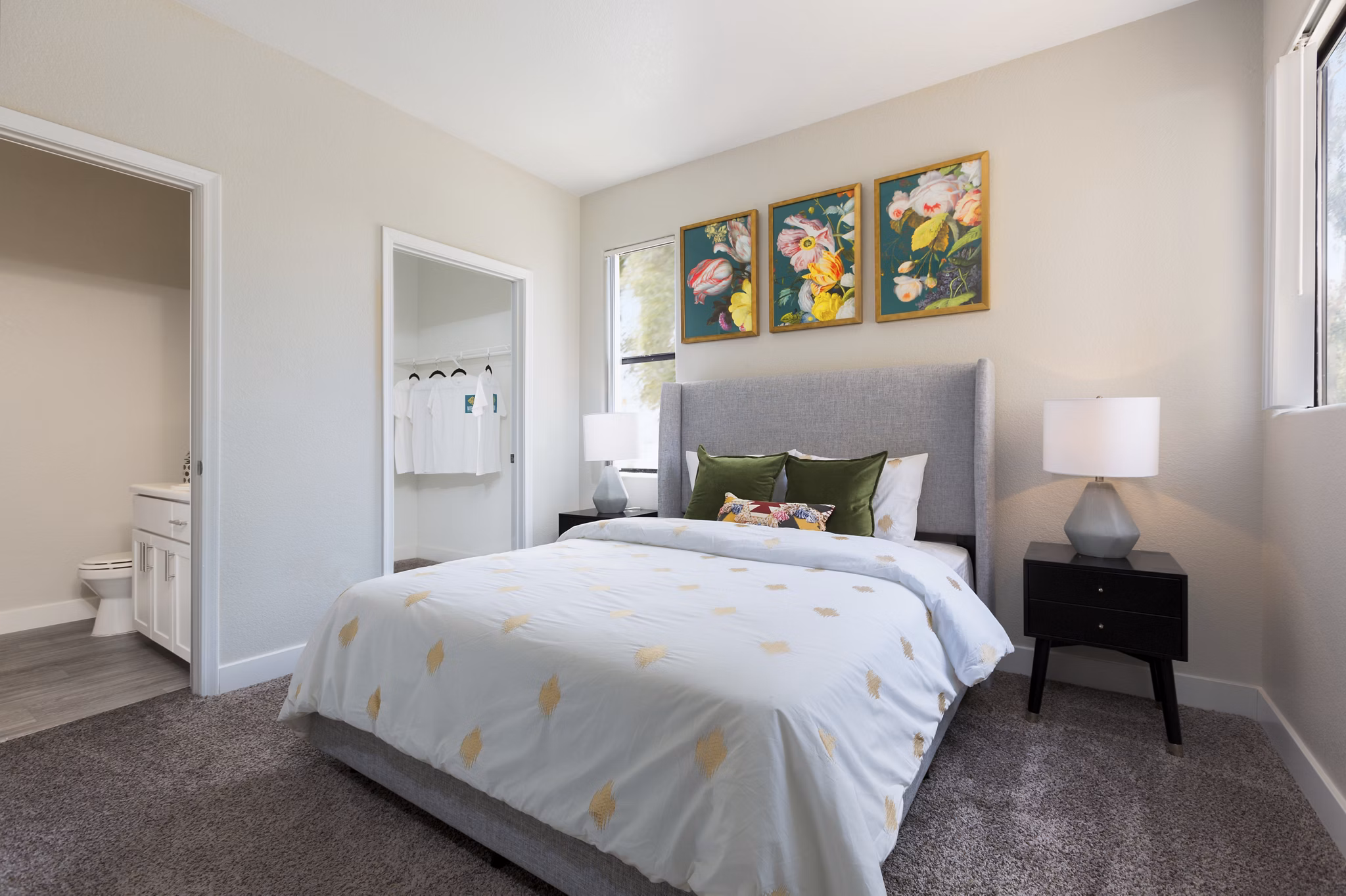 Bedroom featuring contemporary decor and plush bedding at Morada West Apartments