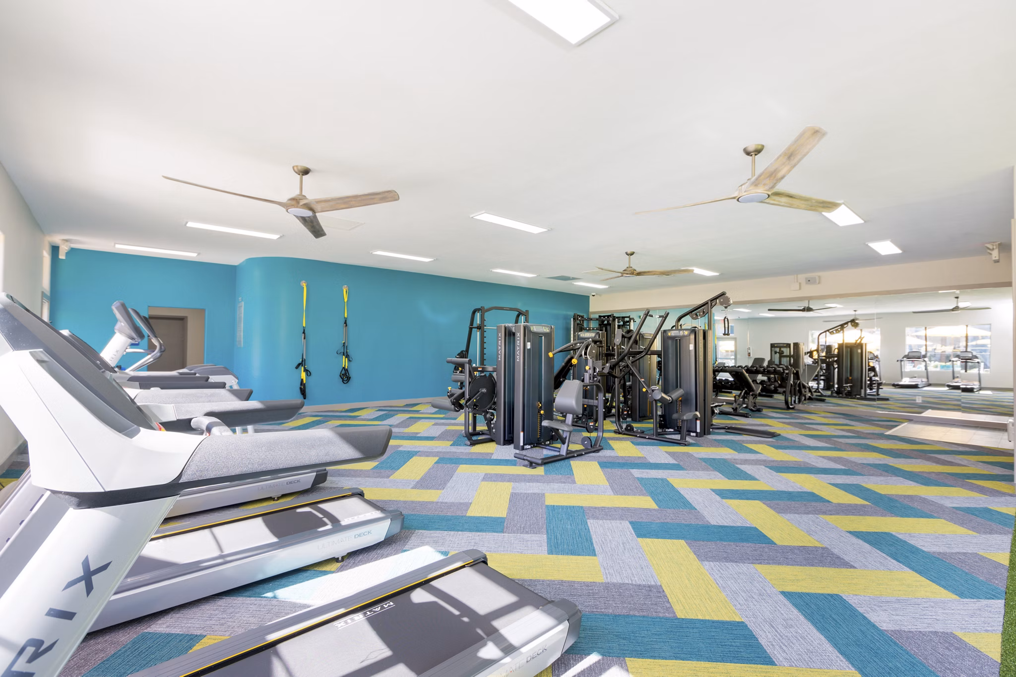 State-of-the-art fitness center with modern equipment at Morada West Apartments, ideal for active lifestyles