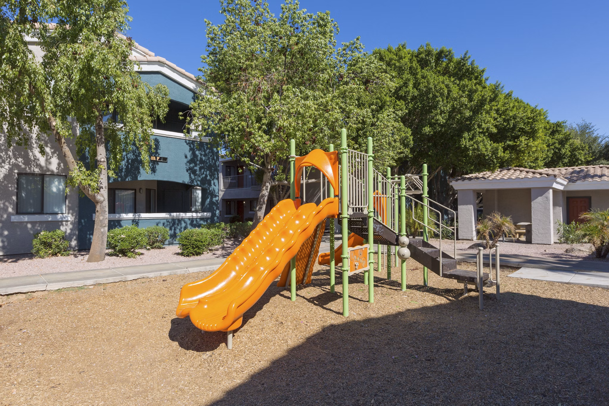 Recreational area with modern seating and lush landscaping at Morada West Apartments