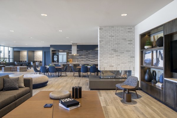 Contemporary clubhouse with elegant furnishings at Gio Apartments, perfect for social gatherings and community events