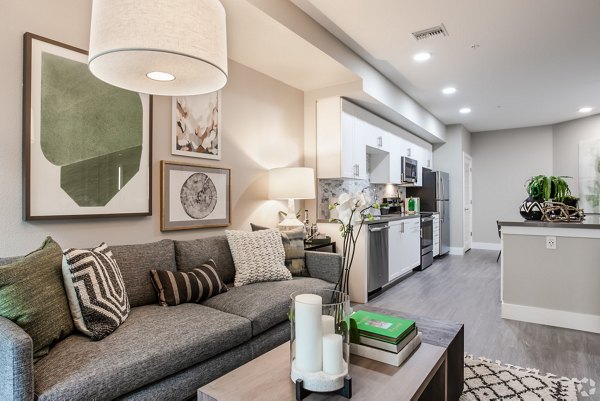 Spacious living room with modern decor at Gio Apartments in San Francisco