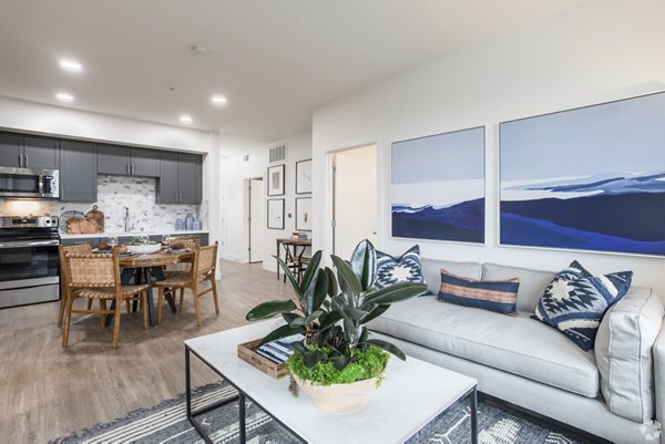 Modern living room with stylish furnishings at Gio Apartments