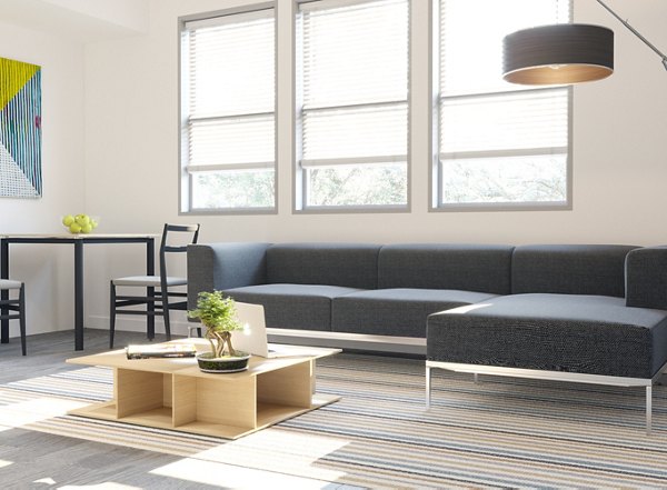 Spacious living room with modern furnishings at Gio Apartments in Baltimore