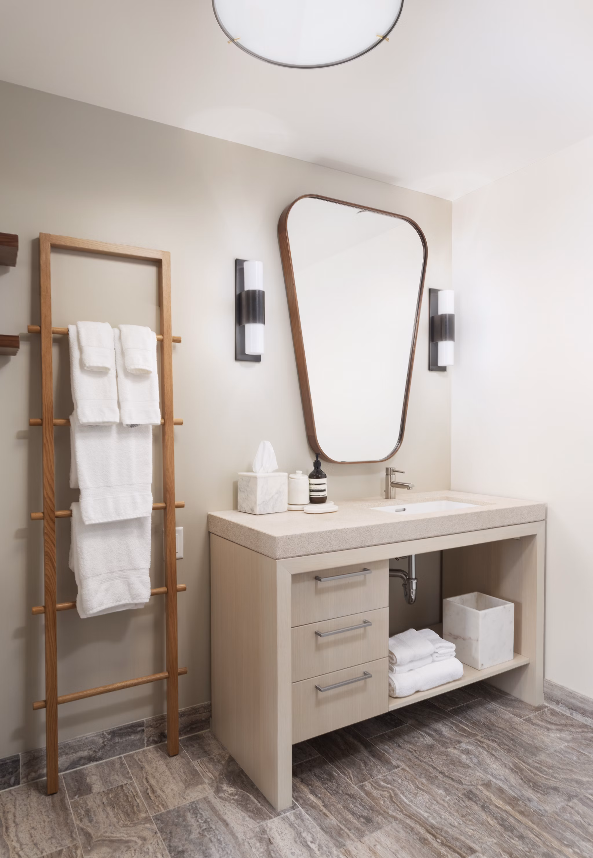 Luxury bathroom with quartz countertops and modern fixtures at Columbia Square Living Apartments