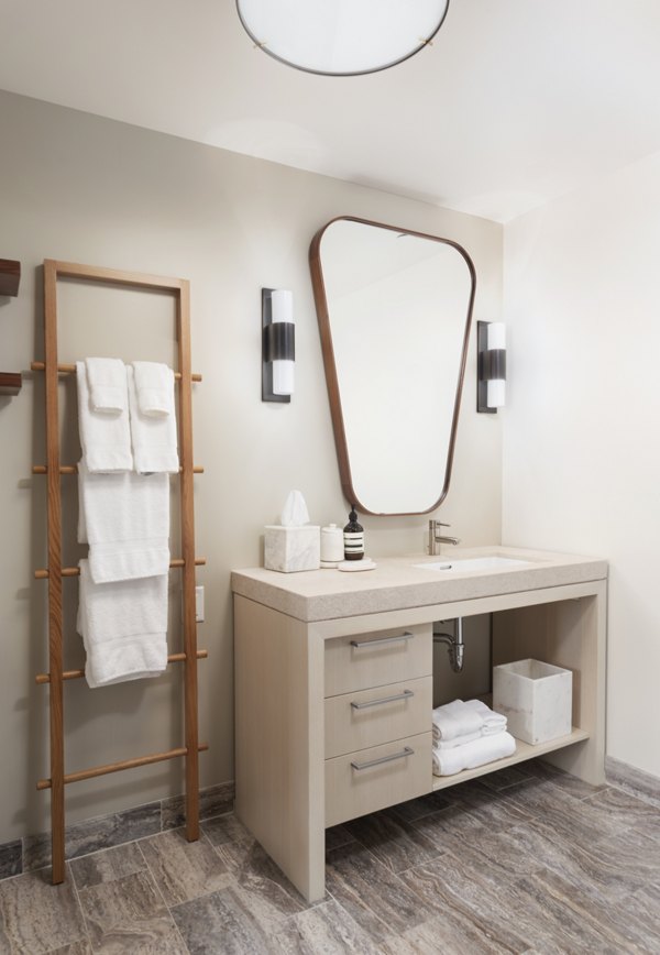 Luxury bathroom with quartz countertops and modern fixtures at Columbia Square Living Apartments