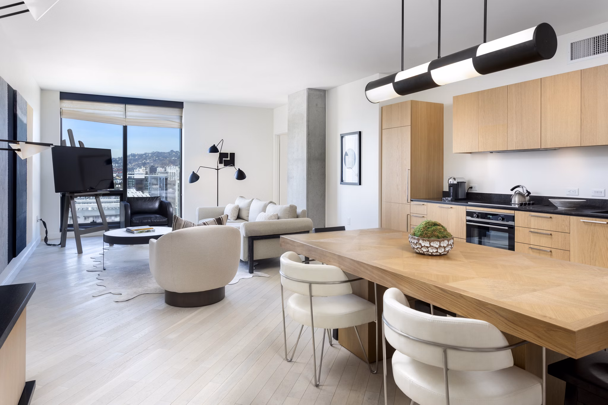Elegant bedroom featuring a plush king-size bed at Columbia Square Living Apartments