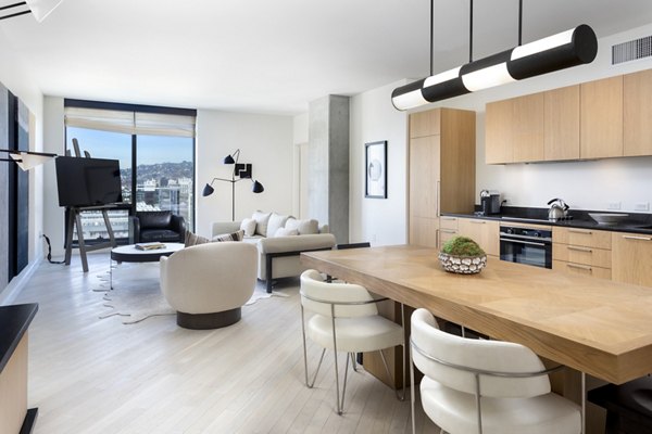 Elegant bedroom featuring a plush king-size bed at Columbia Square Living Apartments