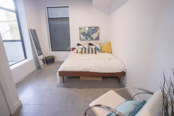 Closet with built-in shelves and ample storage in The Morton Apartments