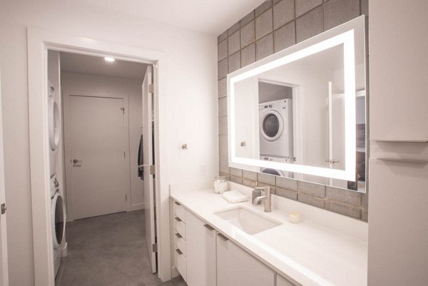 Modern bathroom featuring sleek fixtures at The Morton Apartments