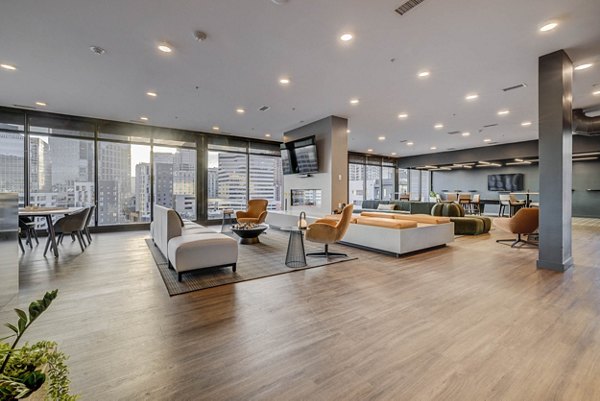 Clubhouse featuring modern design and comfortable seating at The Morton Apartments