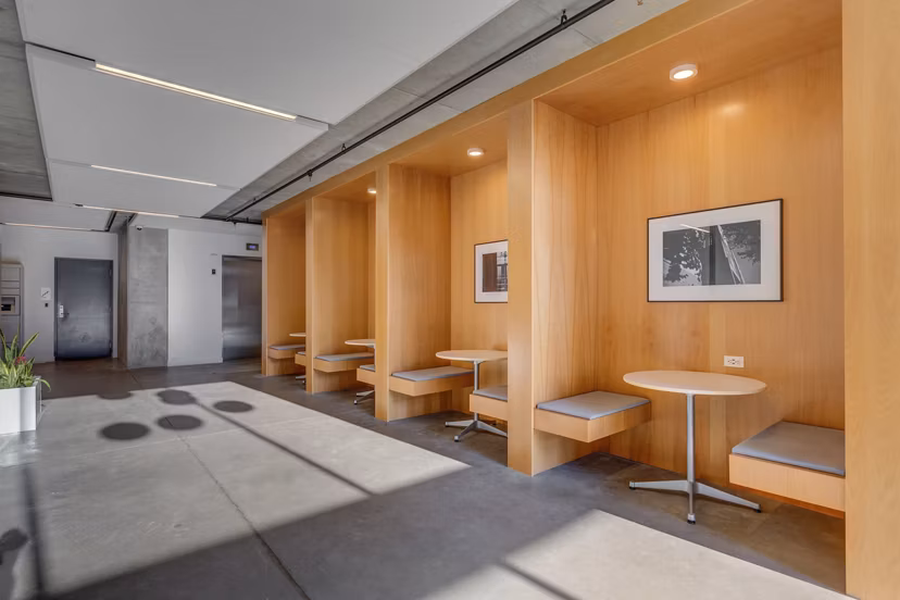 Clubhouse featuring a modern design and social seating at The Morton Apartments