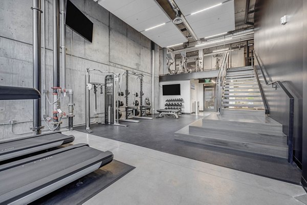 State-of-the-art fitness center with modern equipment at The Morton Apartments