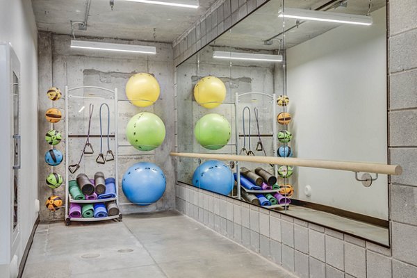 State-of-the-art fitness center at The Morton Apartments with modern equipment and spacious layout for residents' active lifestyle