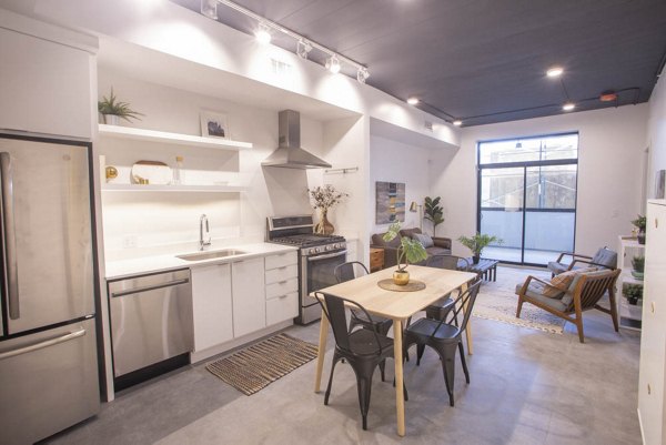 Modern kitchen with stainless steel appliances at The Morton Apartments, Greystar luxury apartments