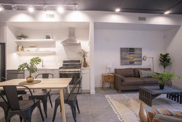 Spacious living room with modern furnishings in The Morton Apartments