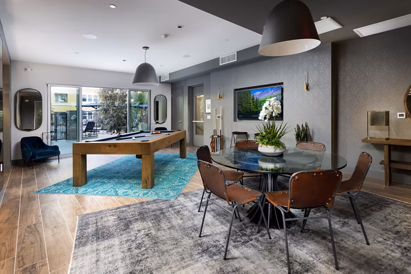 Clubhouse with modern decor at Lex CTR City Apartments, perfect for social gatherings and events