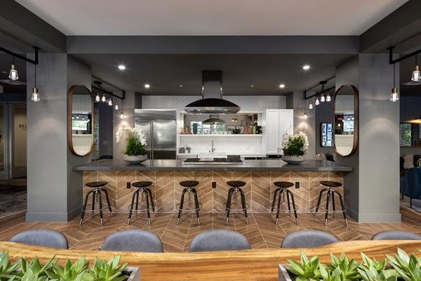 Modern clubhouse featuring sleek design elements at Lex CTR City Apartments in luxury Greystar community
