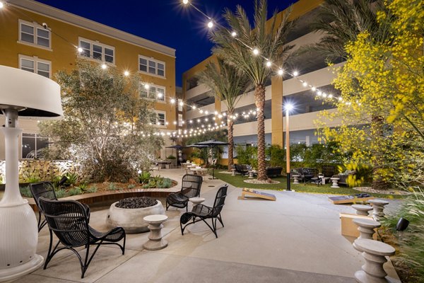 Lex CTR City Apartments: Tranquil courtyard with lush greenery and seating areas, offering a peaceful retreat in the heart of the city