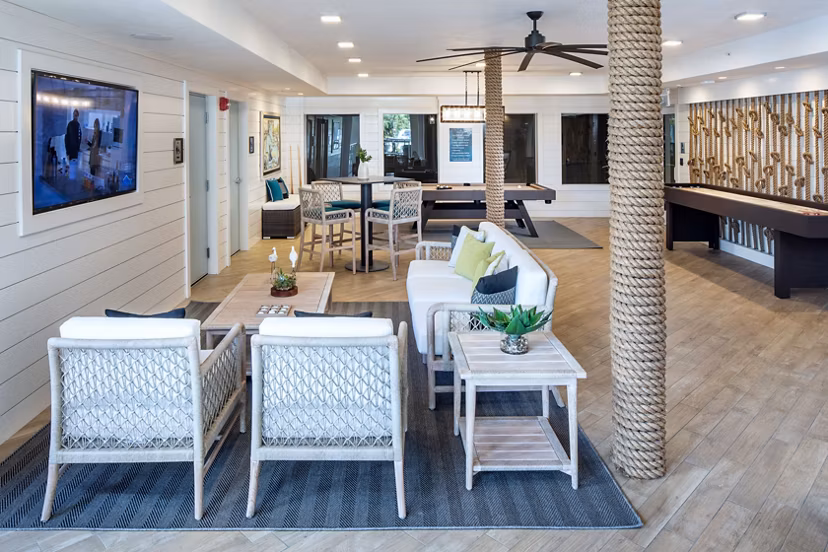Clubhouse with modern decor at 1333 South Ocean Apartments, featuring luxury amenities in a beachfront location